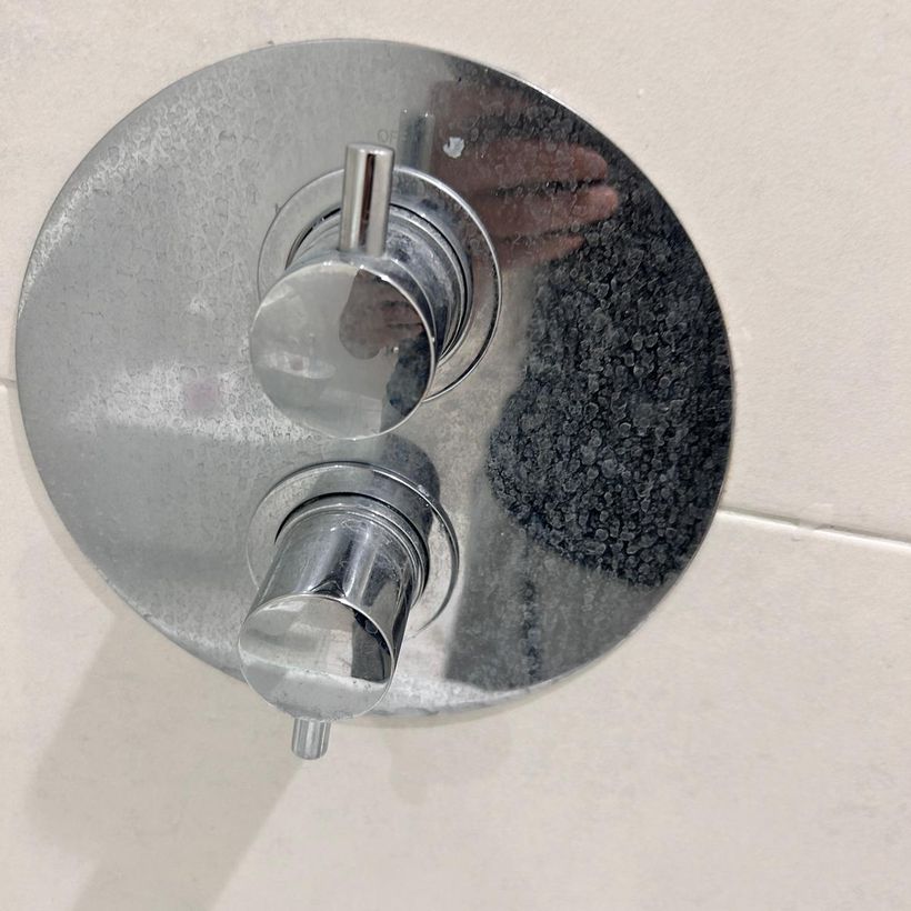 Shower controls before cleaning
